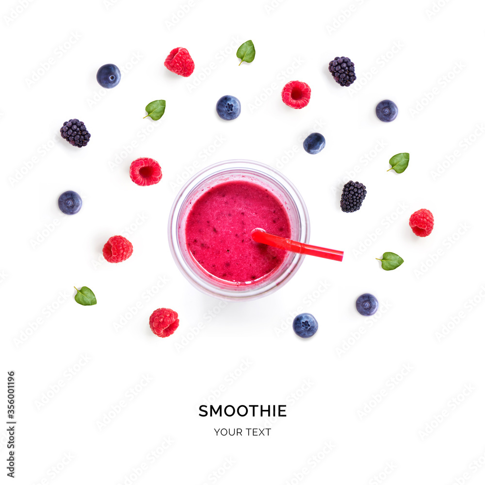 Creative layout made of blackberry and blueberry juice. Flat lay. Food concept. Smoothie on the whit