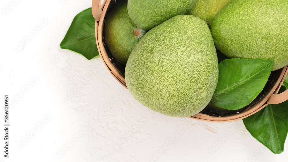 Fresh pomelo, pummelo, grapefruit, shaddock on white background, fruit for Mid-autumn festival, top 