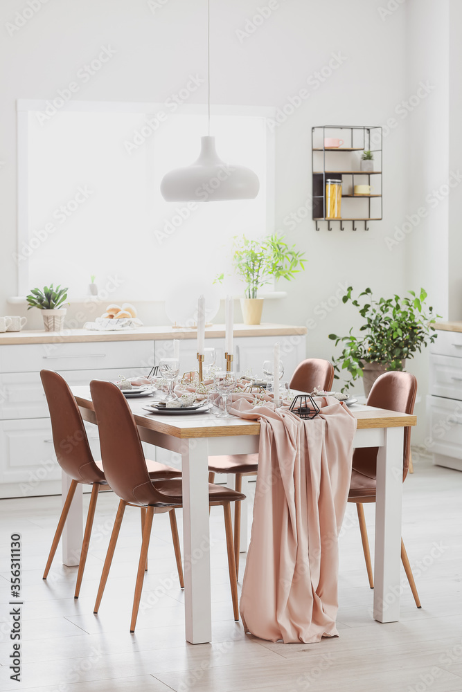 Served table in modern dining room