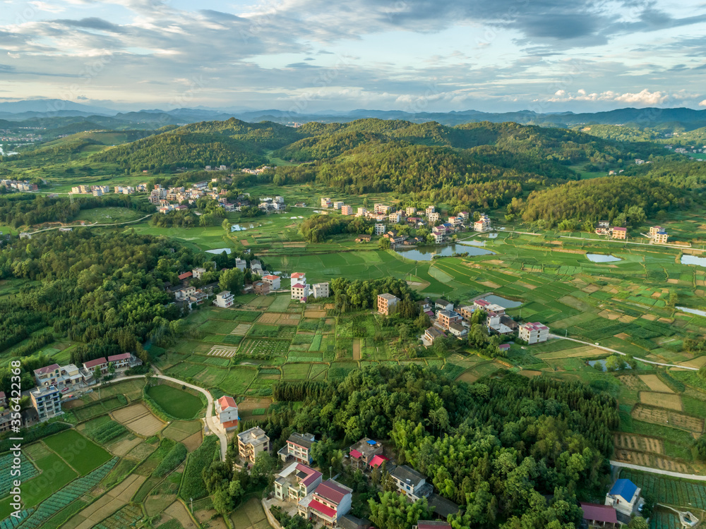 Rural countryside aerial view, green countryside and villages, Hunan, China。