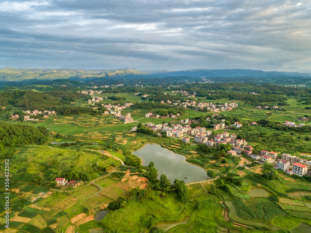 Rural countryside aerial view, green countryside and villages, Hunan, China。