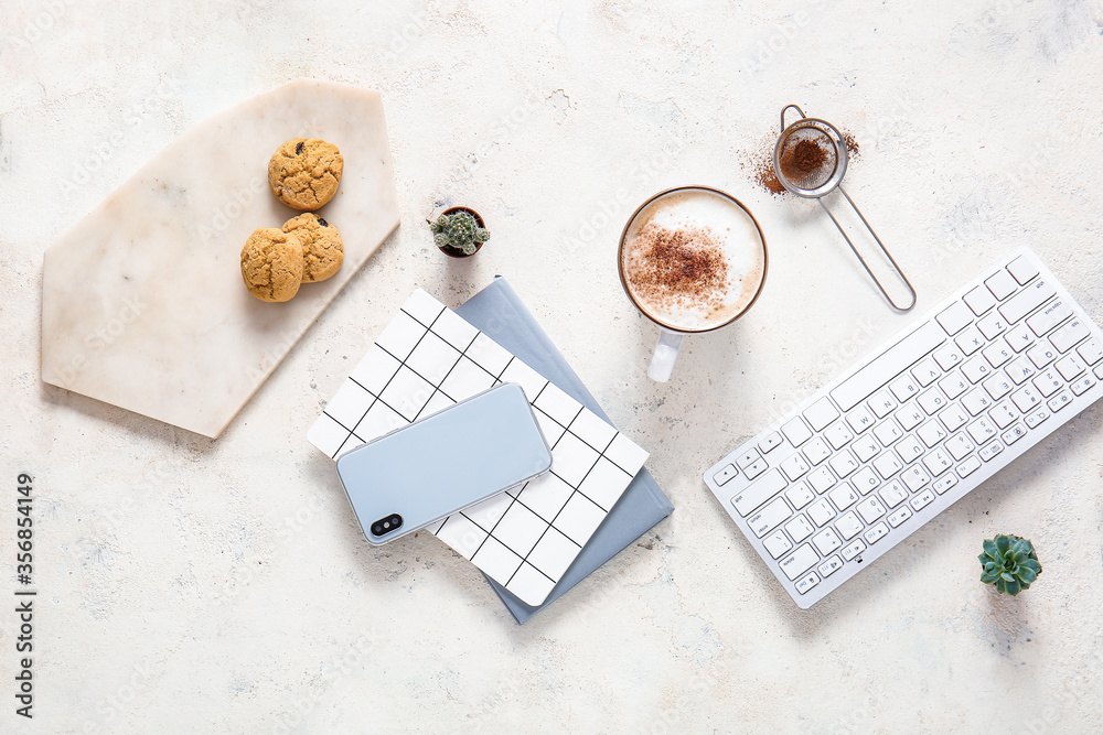 Flat lay composition with cup of coffee on white background