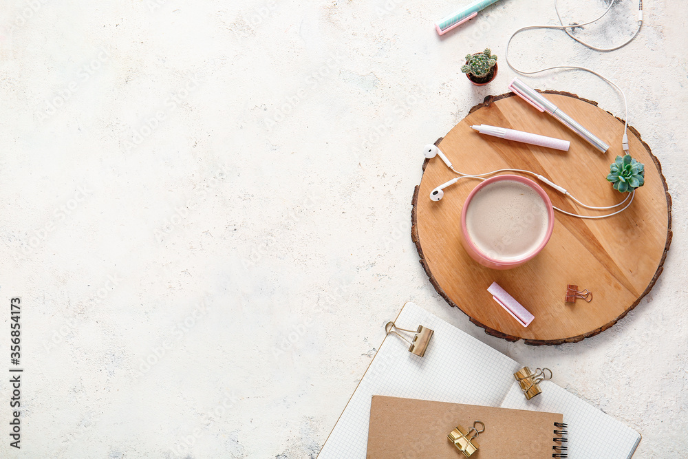 Flat lay composition with cup of coffee on white background