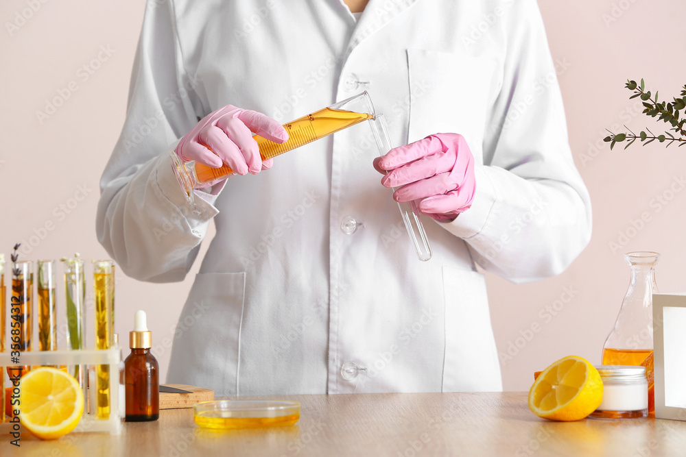 Beautician preparing natural cosmetic, closeup