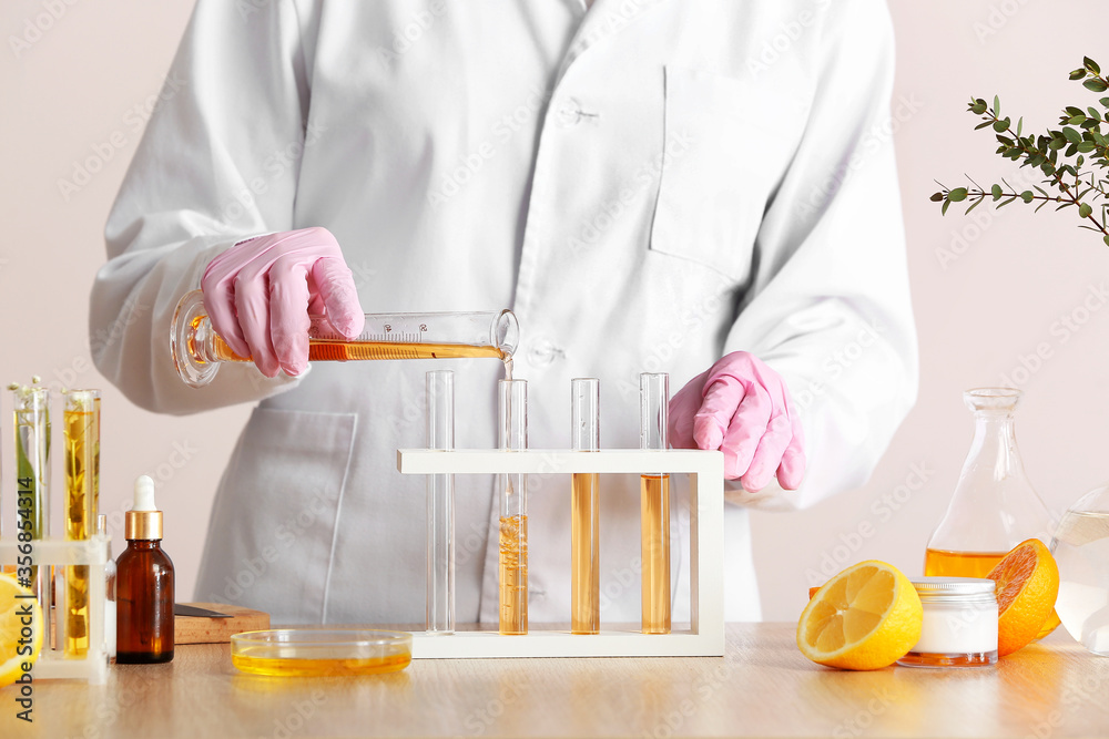 Beautician preparing natural cosmetic, closeup