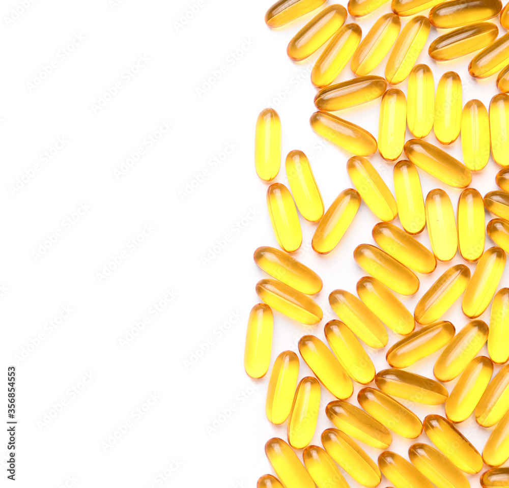 Fish oil capsules on white background