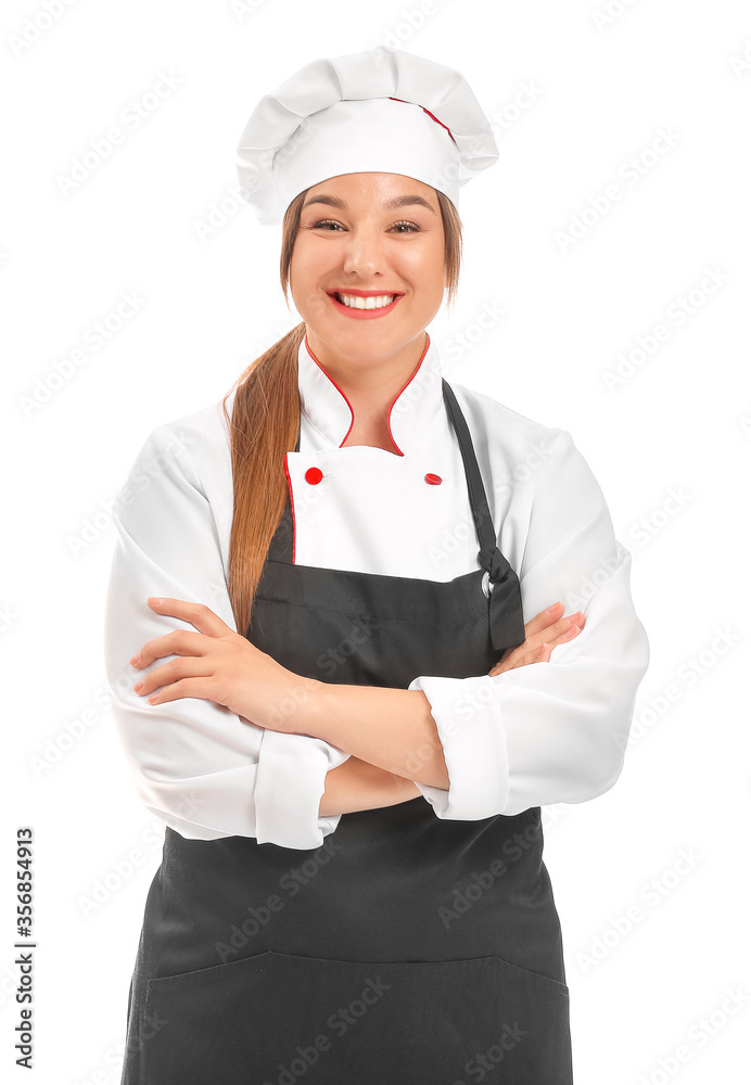 Young female chef on white background