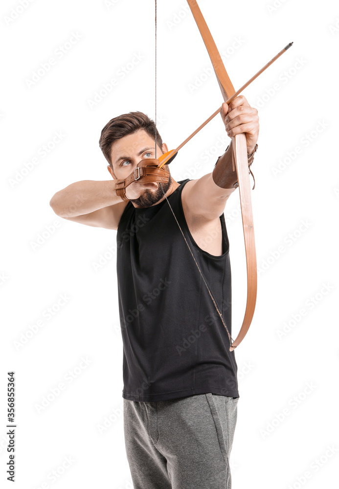 Handsome man with crossbow on white background