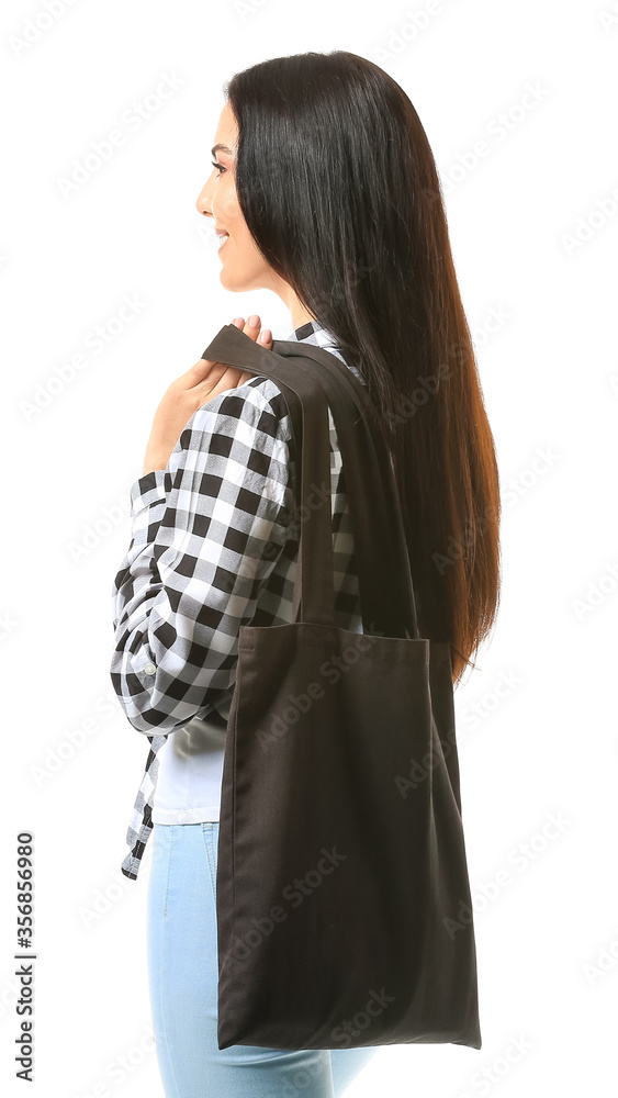 Young woman with eco bag on white background