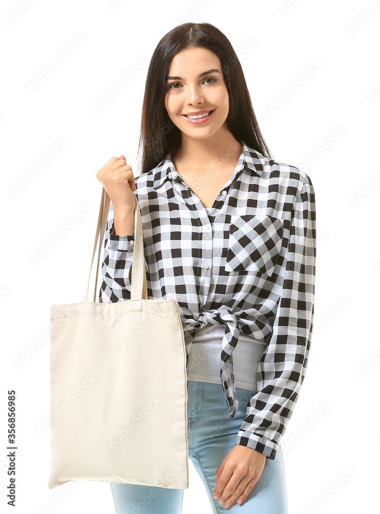 Young woman with eco bag on white background