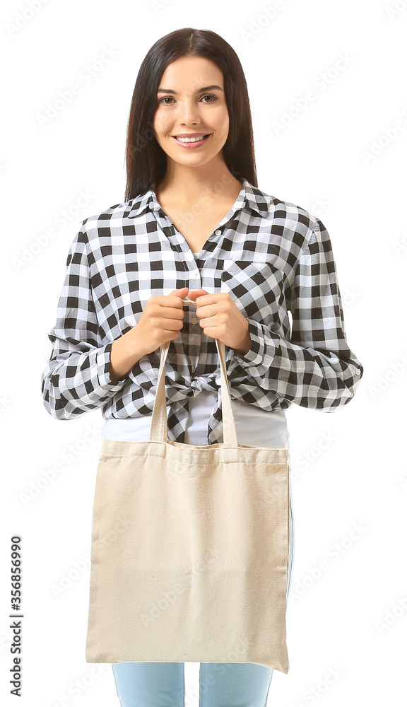 Young woman with eco bag on white background