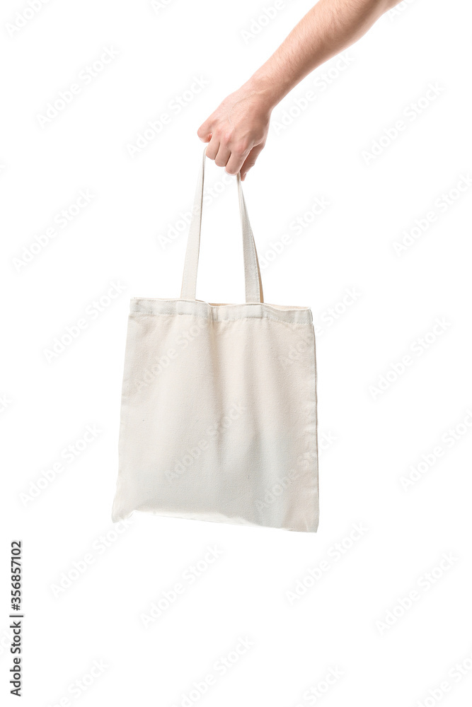 Male hand with eco bag on white background