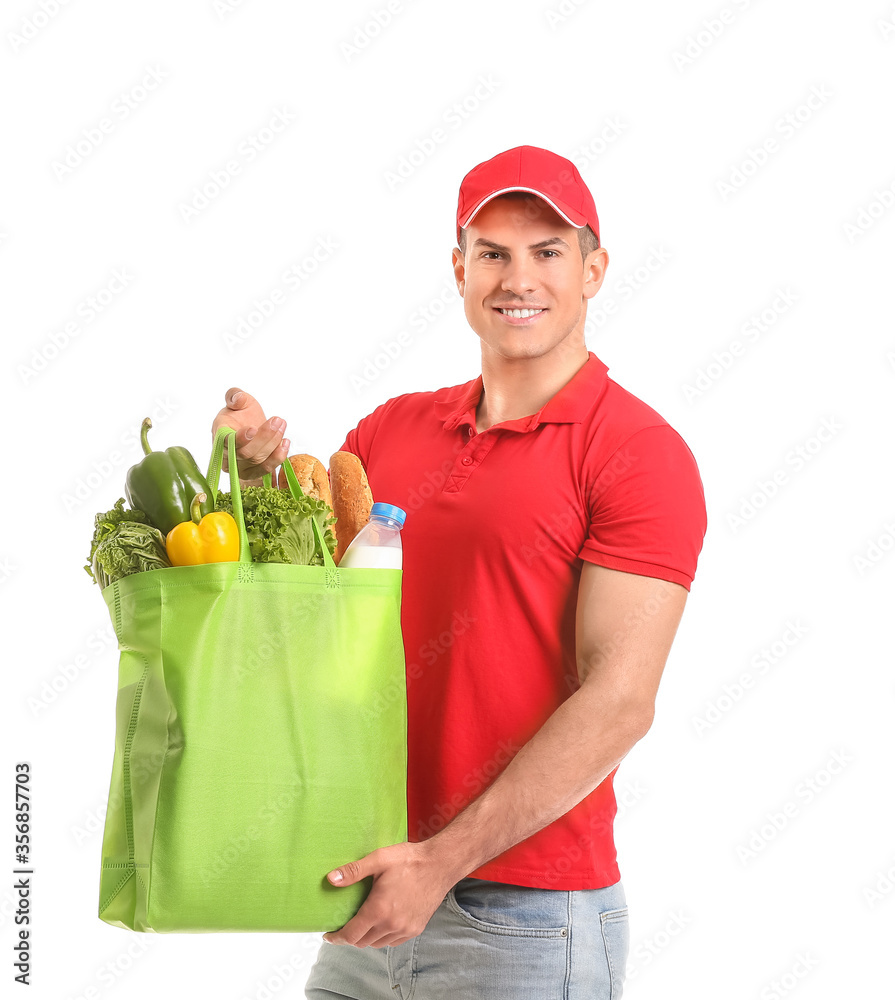 Delivery man with food in bag on white background