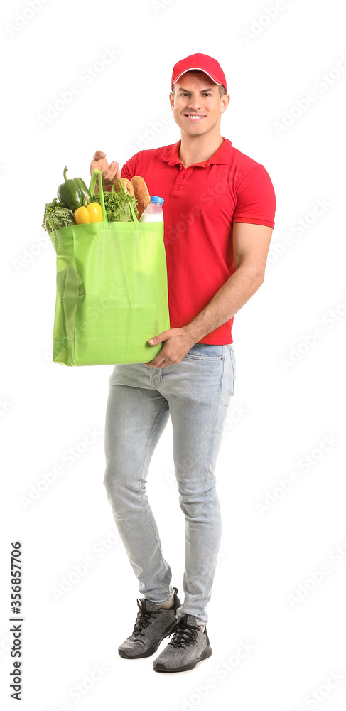 Delivery man with food in bag on white background