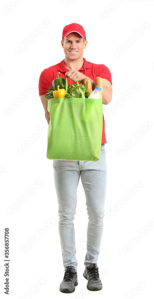 Delivery man with food in bag on white background