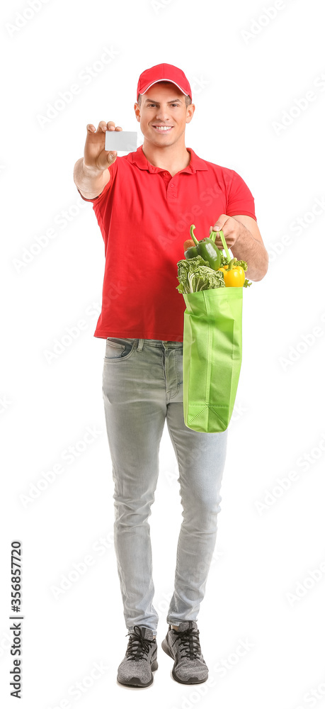 Delivery man with food in bag and business card on white background