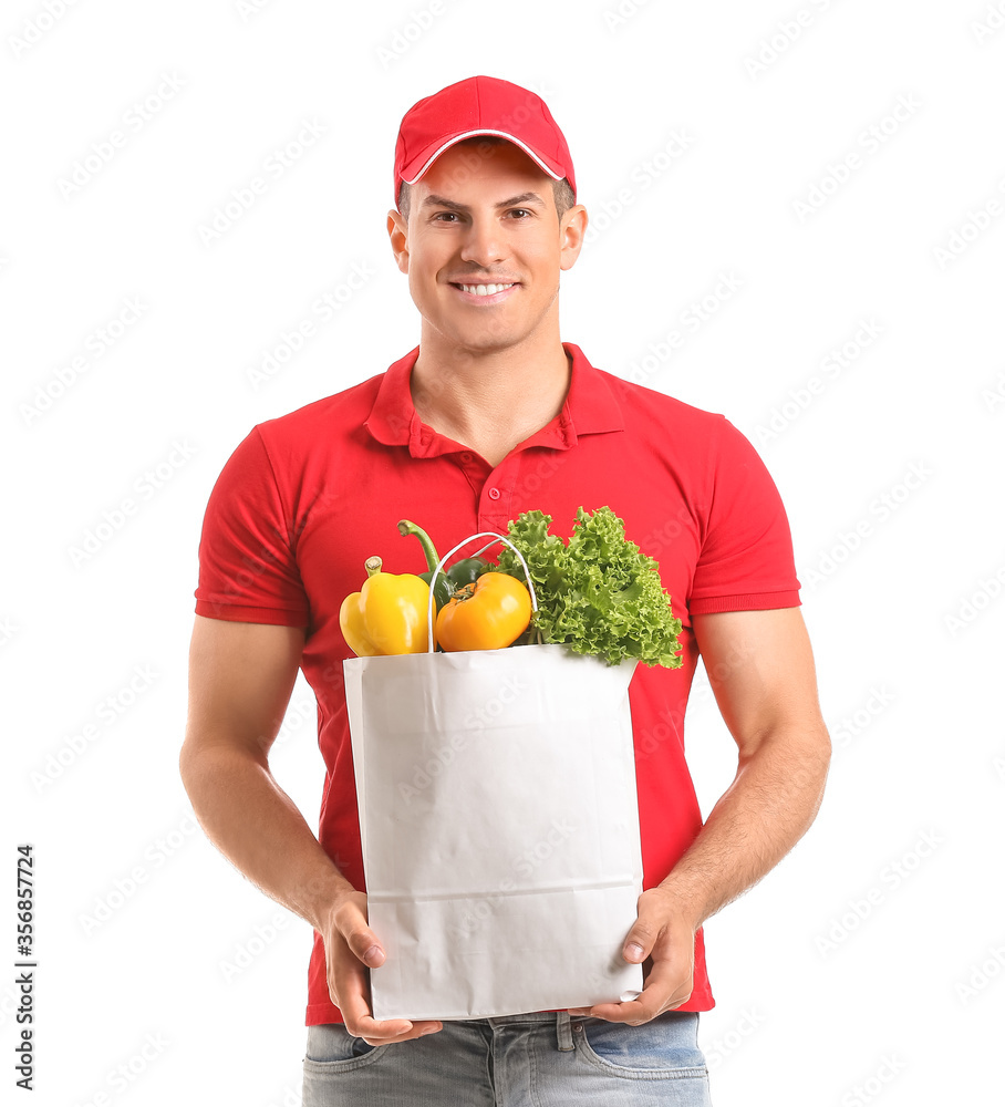 Delivery man with food in bag on white background