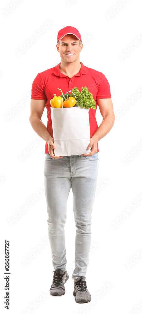 Delivery man with food in bag on white background