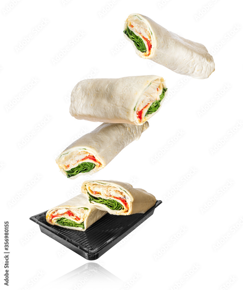 Pita sandwiches in the air, isolated on a white background