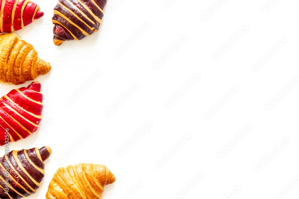 Frame of croissants - fresh bakery on white background