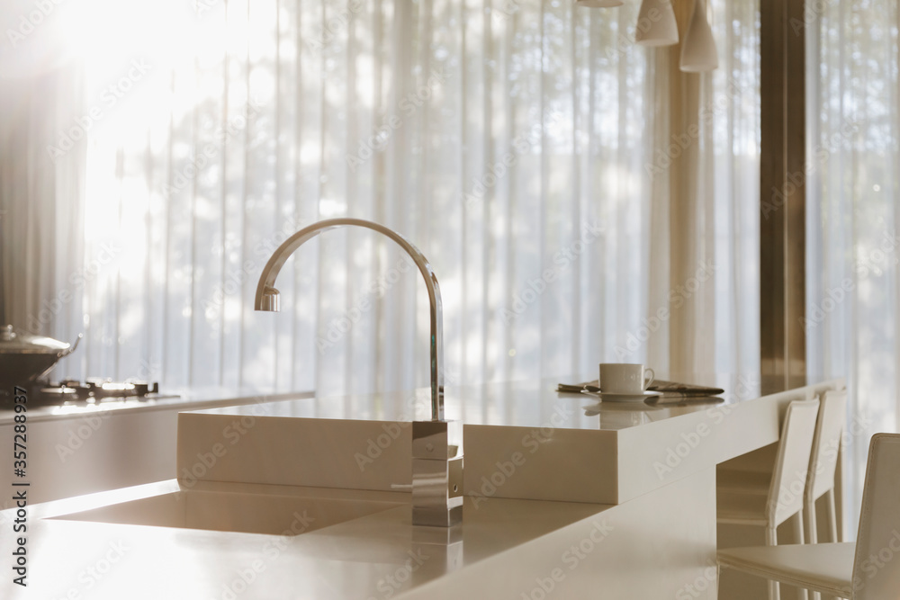 Faucet and sink in modern kitchen