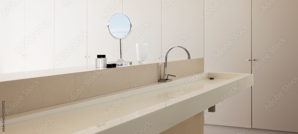 Sink and mirror in modern bathroom