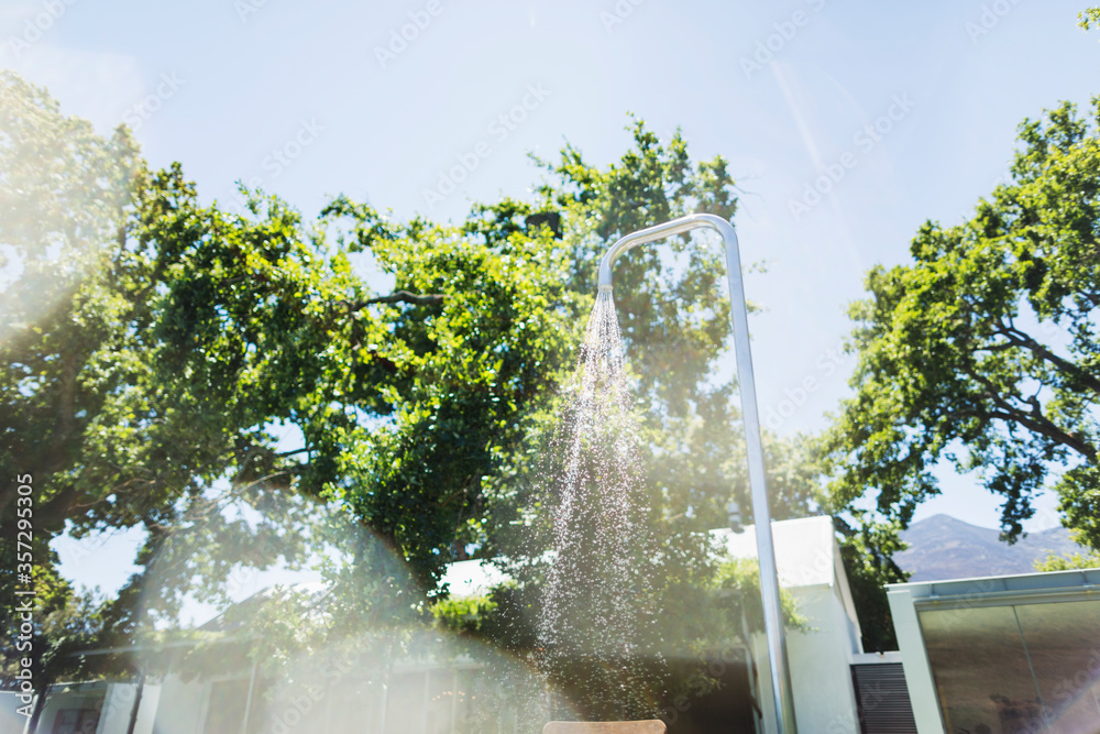 Running water from outdoor shower