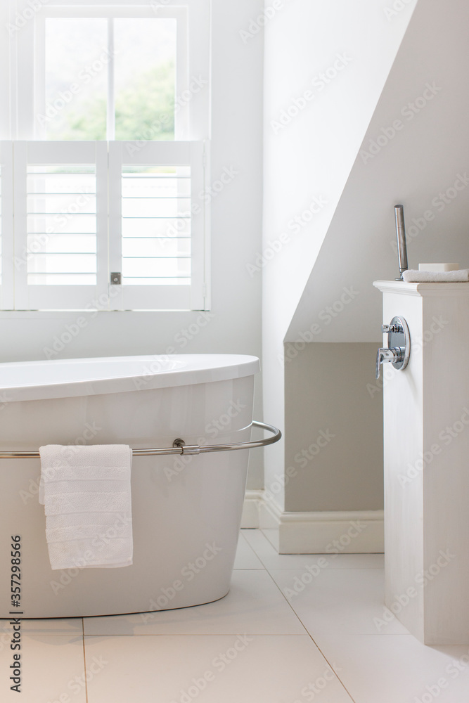 Soaking tub in luxury bathroom