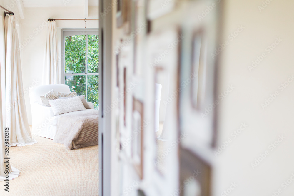 Wall hangings and armchair in rustic house