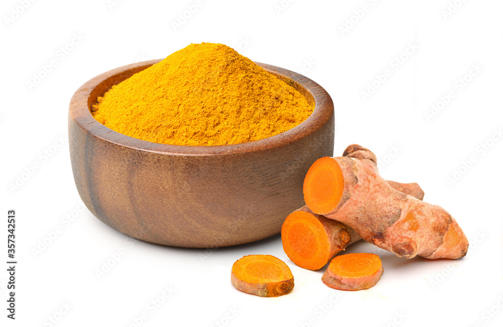 Finely dry Turmeric (Curcuma longa Linn) powder in wooden bow with  rhizome (root) sliced isolated o