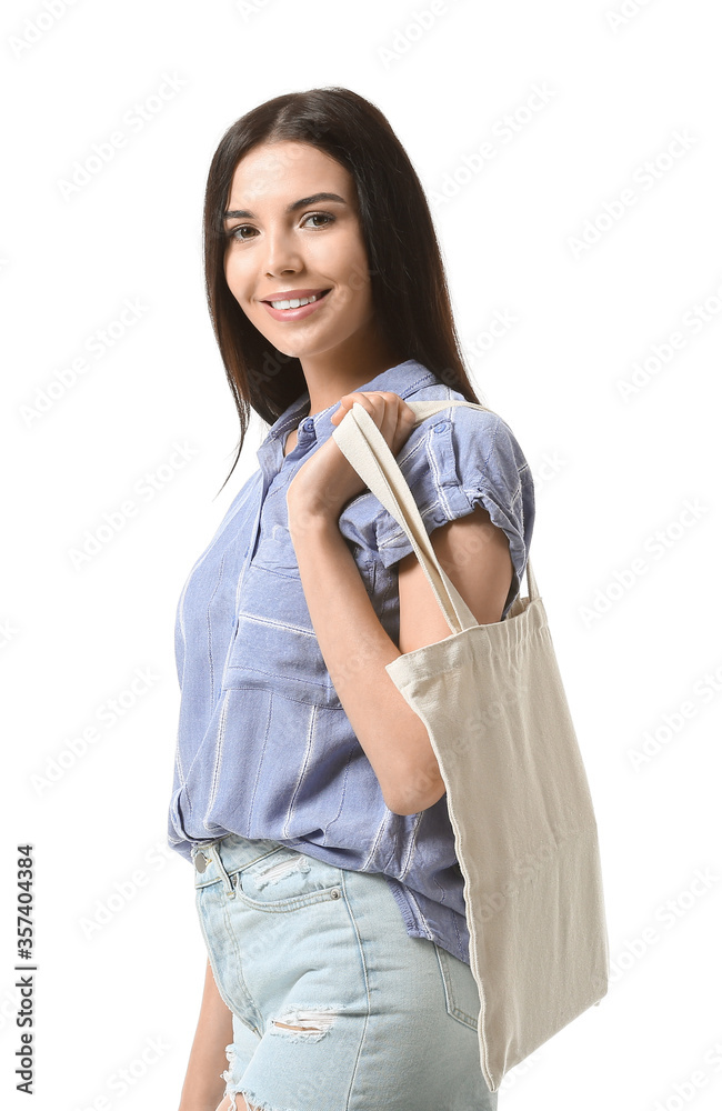 Young woman with eco bag on white background