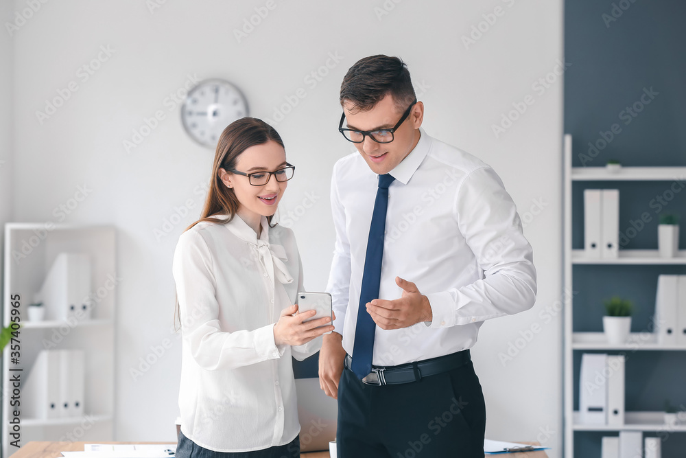 Young business people working in office