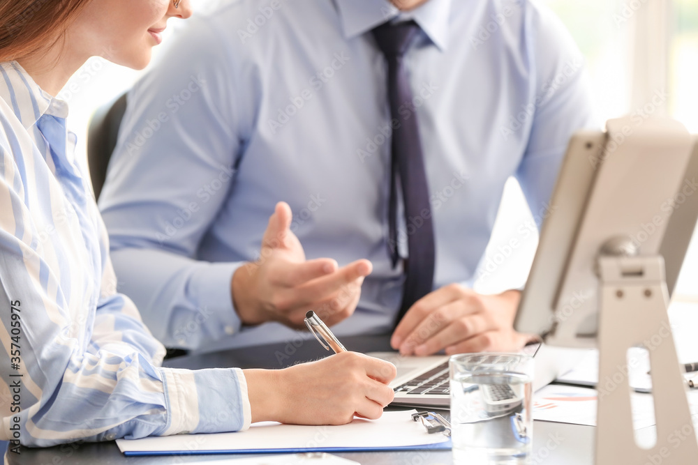 Young business people working in office