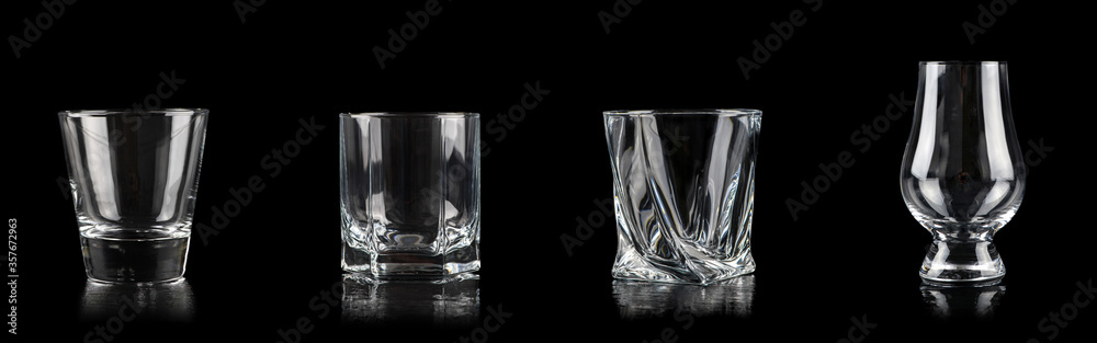 Set of four empty glasses for alcoholic drinks