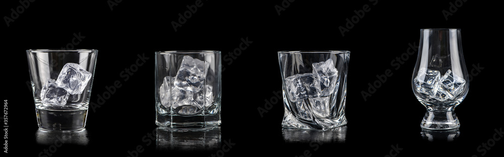 Set of four glasses with cub ice for alcoholic drinks