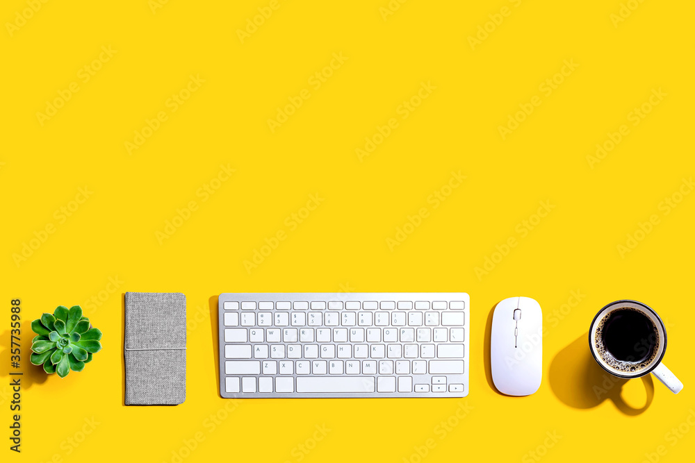 Computer keyboard and mouse from above - overhead view