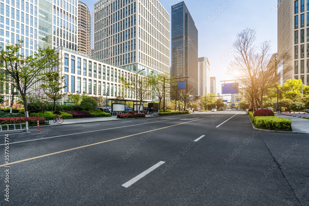 Asphalt road and modern city