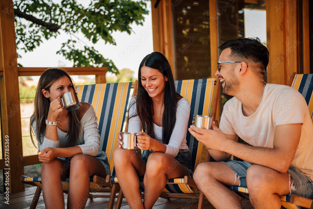 Friends enjoying morning at cozy patio