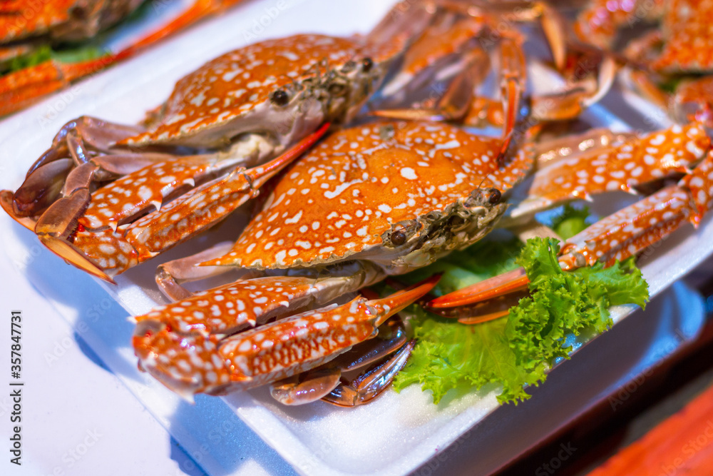 Cooked crabs as a street food at the local market in Thailand