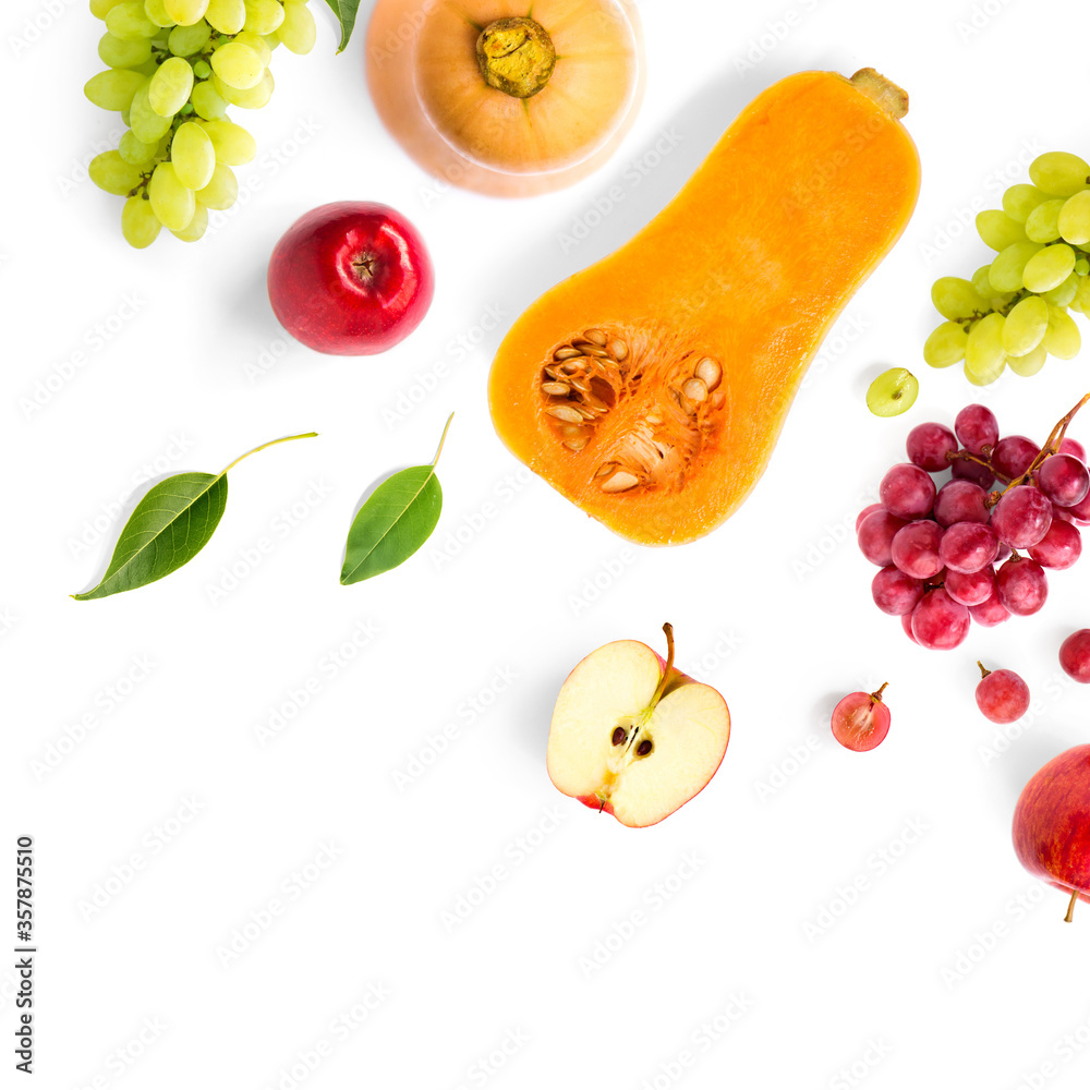 Creative layout made of green and red grape, Fruits and vegetable on the white background.