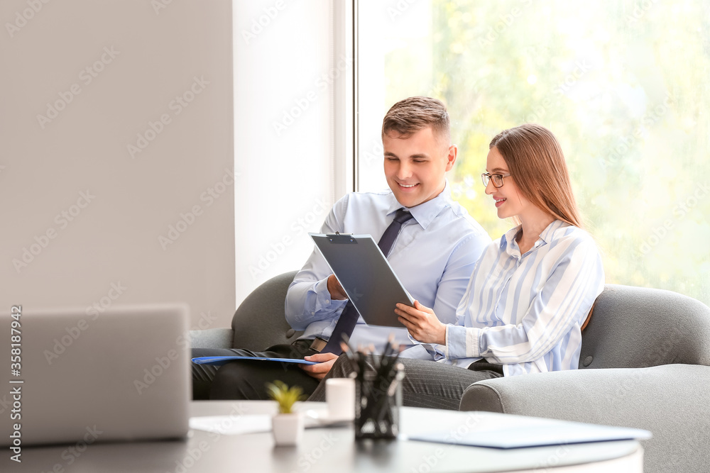 Young business people working in office