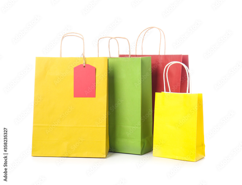 Paper shopping bags on white background