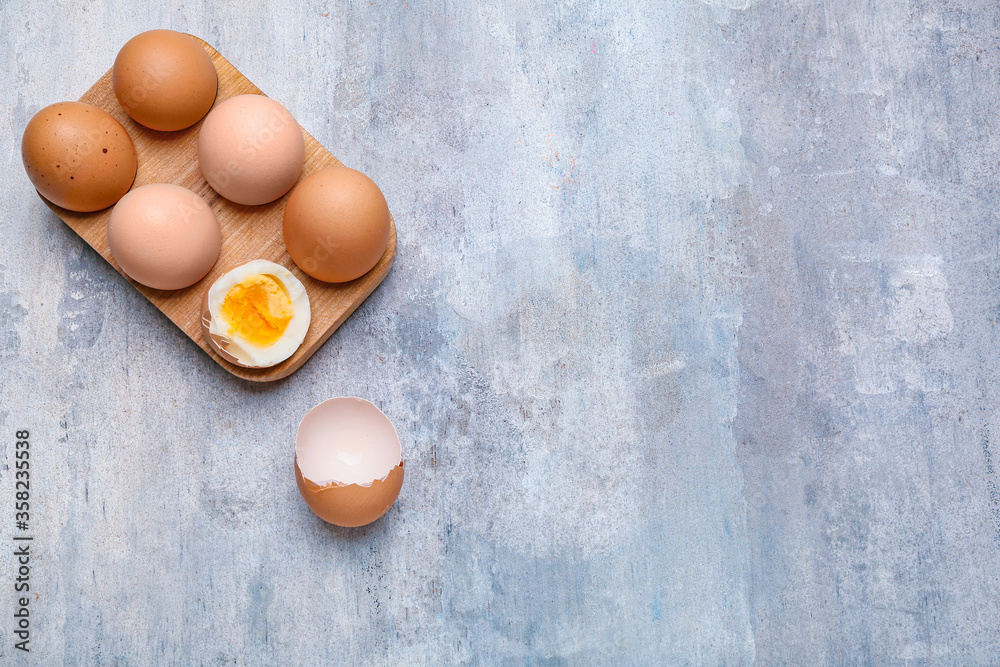 Boiled chicken eggs on table