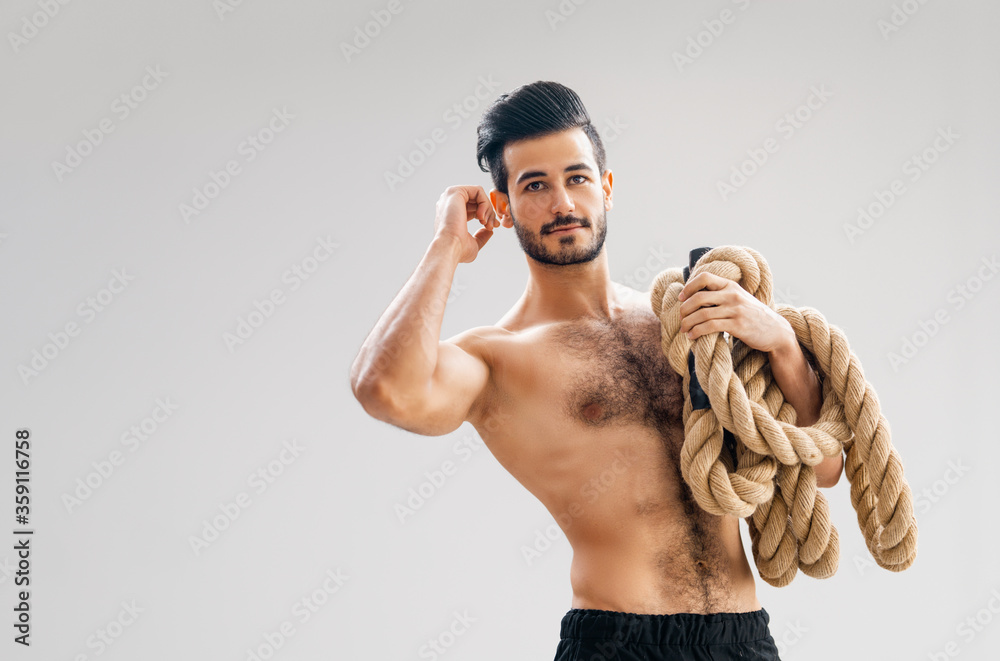 young man doing crossfit exercises