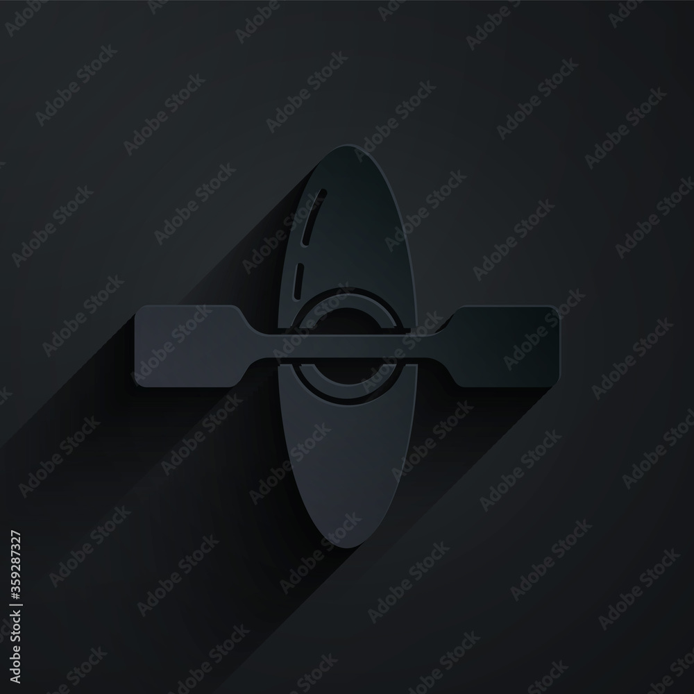 Paper cut Kayak and paddle icon isolated on black background. Kayak and canoe for fishing and touris