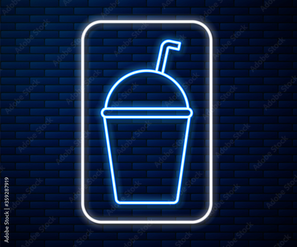 Glowing neon line Milkshake icon isolated on brick wall background. Plastic cup with lid and straw. 