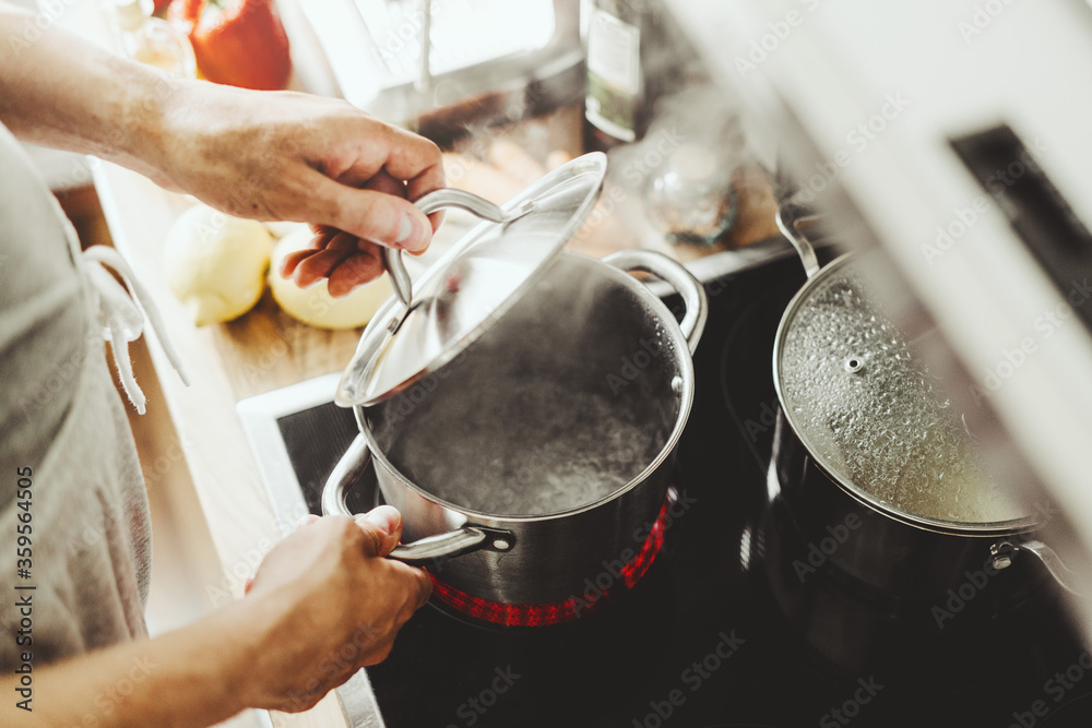 Man cooking fresh food at home