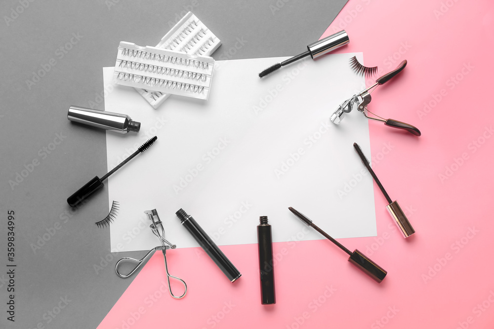 Mascara, eyelash extensions and curlers on color background