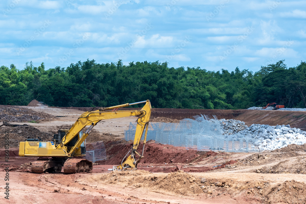 Front End Loader,Excavator working at construction site.