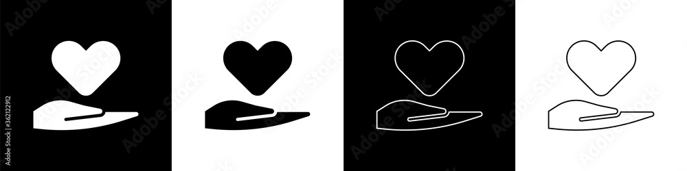 Set Heart on hand icon isolated on black and white background. Hand giving love symbol. Valentines d